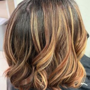 Layered lob haircut styled at Spirit Hair Company High Wycombe for autumn movement and volume